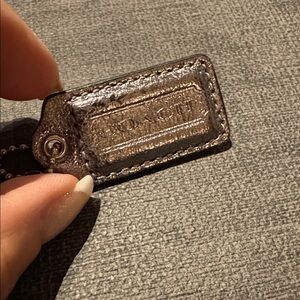 Coach SILVER METALLIC LEATHER hang tag